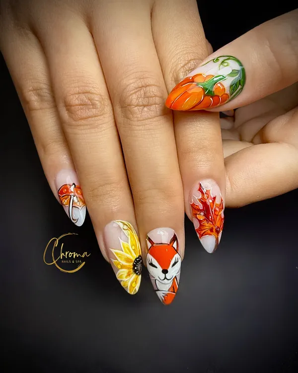 Hand-painted fox face, maple leaves, pumpkin and sunflower nails