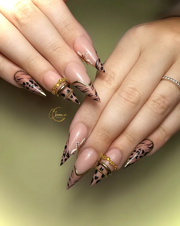 Warm nude nails with leopard print and gold
