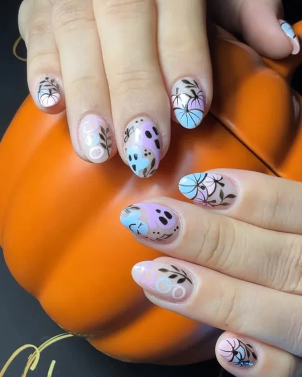 Pastel ombré nails with fine leaf line art